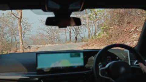 Driver Navigating Scenic Road During Road Trip Journey Stock Footage 345495371