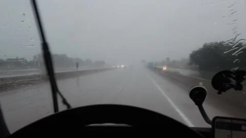 Driver navigating through a heavy rainstorm Stock Footage 281764230