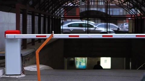 Driver open turnpike with safe key to parking the car underground Stock Footage 82214424