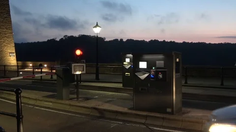 Driver paying bridge toll Stock Footage 111492438