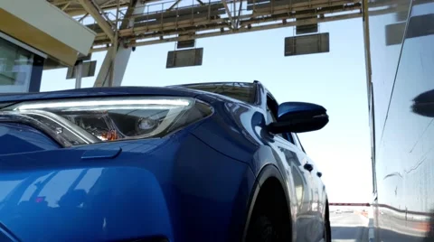 Driver pays a toll road Video stock 64044707