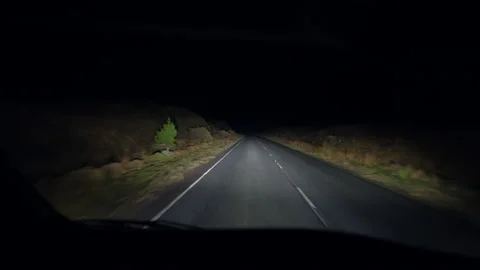 Driver perspective at night in the dark. Person point of view driving on em.. Stock Footage 234000302
