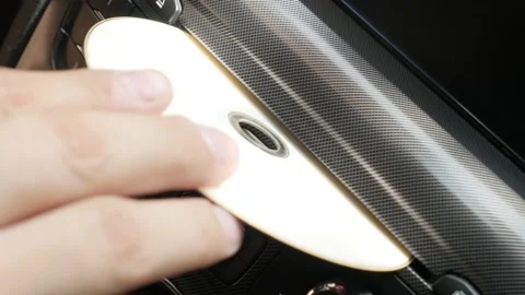 Driver plays CD in modern car sound system 4K video Stock Footage 95842440