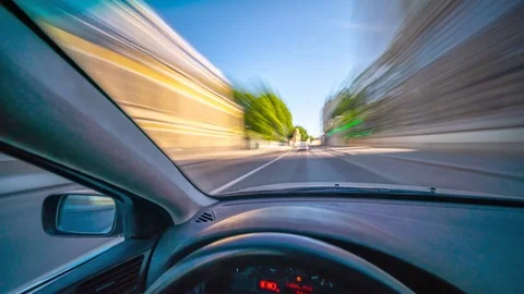 Driver point of view in car's windshield on the city street Timelapse Stock Footage 121727208
