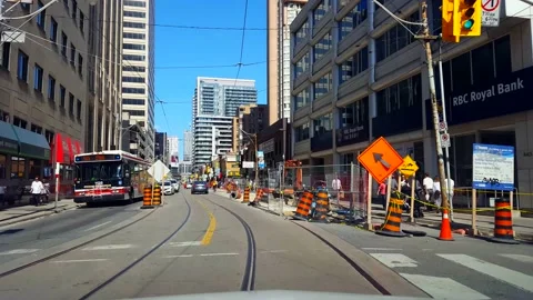 Driver Point of View Entering and Driving Through Construction Zone Downtown Stock Footage 168762489