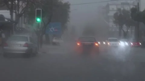 Driver point of view in moving car while raining Stock Footage 132447330
