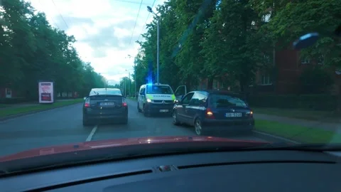Driver Point Of View Passing Police Traffic Stop In Riga Latvia Slow Motion Stock Footage 341922927