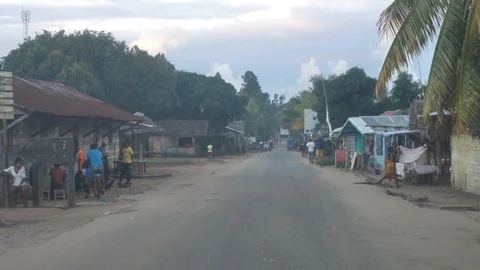 Driver POV Driving Through Madagascar Town, Africa Stock Footage 125353513