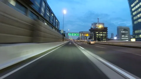 Driver POV hyperlapse through the city lights during twilight in Tokyo. Stock Footage 61640437