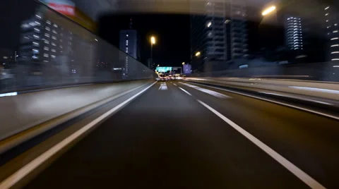 Driver POV hyperlapse variation through the brigdes and city lights of Tokyo. Stock Footage 61512404