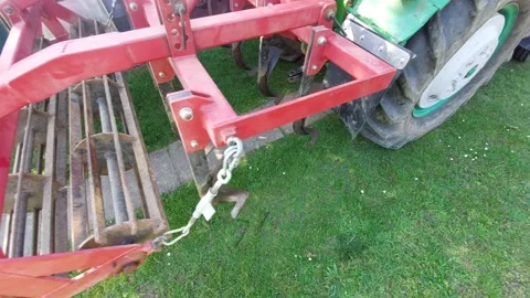 Driver POV Perspective of Tractor Reversing to Connect Red Plow, Farming Industr Stock Footage 333642552