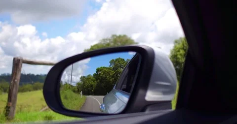 Driver POV from side mirror Stock Footage 72606104