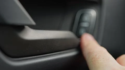 Driver press lock button for locking the vehicle door. Person push car door.. Video stock 293844763
