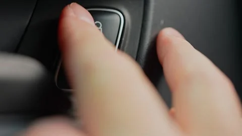 Driver press unlock button to unlocking the vehicle door. Person push car d.. Video stock 293844747