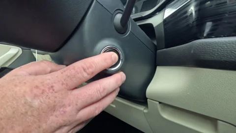 Driver Pressing Start Stop Engine Button Inside Car Stock-Footage 335103193