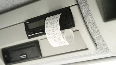 Driver printing his day shift data from a digital tachograph Stock Footage 170505532