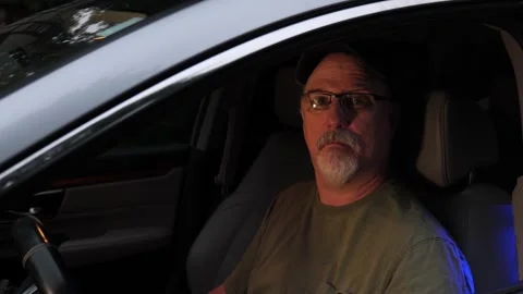 Driver is pulled over by the police for a traffic violation Stock Footage 338405469