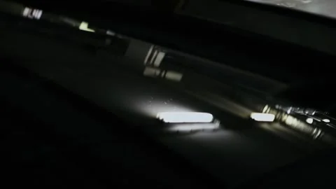 Driver pushes button for shut car roof hatch Stockbeeldmateriaal 276370510