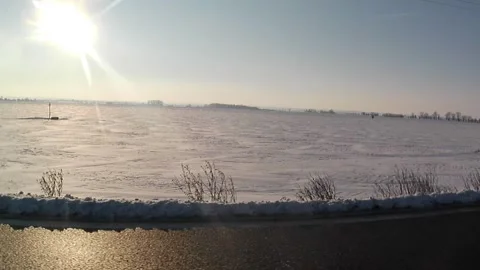 Driver side view video of snowy landscape of southern Slovakia. Видео 331317982