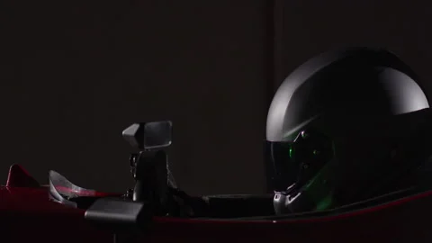 Driver sitting inside his race car Stock Footage 264402634