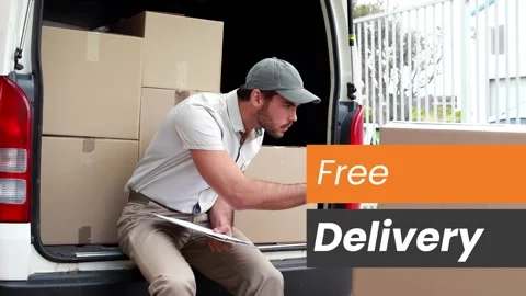Driver sitting on van noting, Free Delivery graphic sliding in, causing box Stock Footage 330427782
