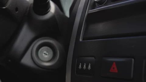 The driver starts the car engine. Close up. Video stock 90758329