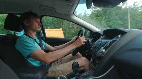 Driver Starts Driving Slow Motion Stock Footage 156711003