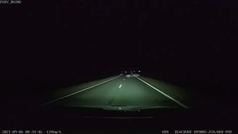 Driver Surprised by Stranded Car During Night Drive, Arkhangelskaya Oblast, Russ Stock Footage 205398504