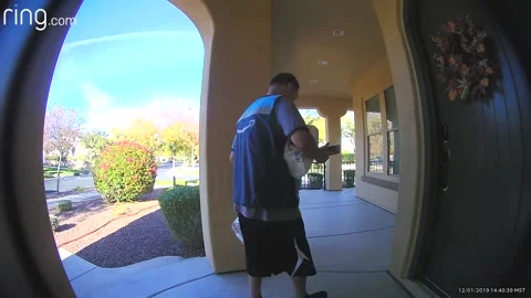 Driver Takes Package Back After Taking Picture of Delivery, Buckeye, Arizona, US Video stock 205200784