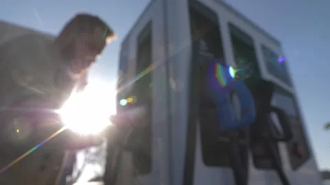 Driver Taking Charging Plug From Station To Charge Modern Electric Car Vidéo 342579762