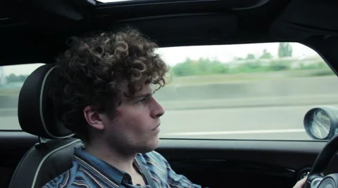 Driver talking on the phone while driving on the highway Stock Footage 41573000