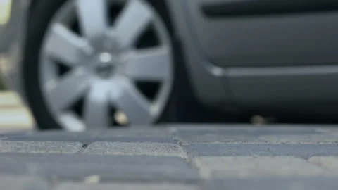 Driver throwing stub of cigarette on pavement, air pollution, dirty sidewalk Stock Footage 91611578