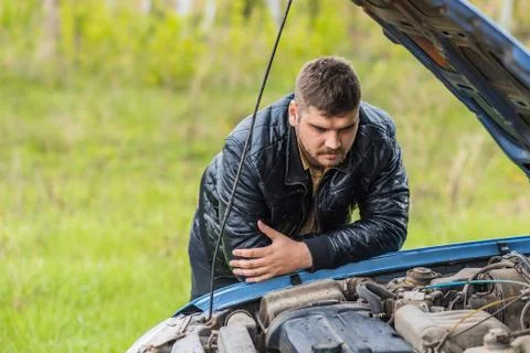 The driver tries to start a car Stock Photos