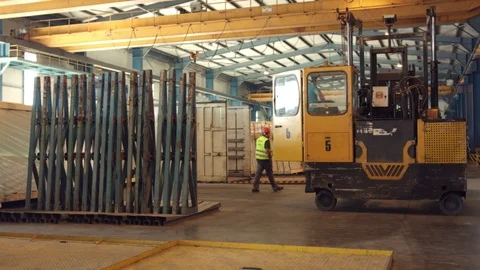 Driver on truck for packaging and loading glass products  Stock Footage 121309902