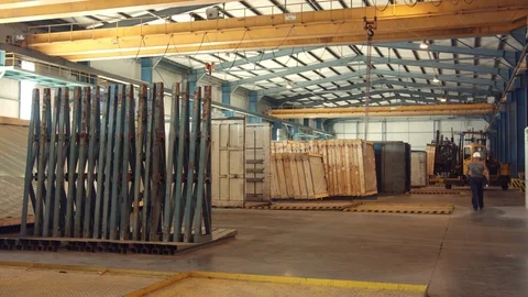 Driver on truck for packaging and loading glass products  Stock Footage 121310058