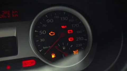 The driver turns car key in the ignition switch initiating engine startup as Stock Footage 331363591