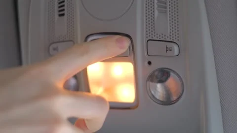 The driver turns on the interior lighting of the car Stock-Footage 304007522