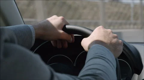 Driver turns the steering wheel aggresively Stock Footage 40737185