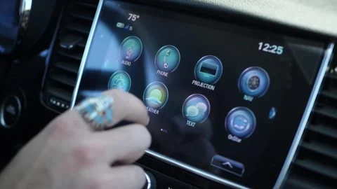 Driver uses apps on the car display Stock Footage 144946012