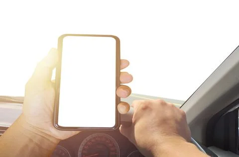 Driver uses the phone while driving. Modern smartphone Isolated screen for mo Stock Photos