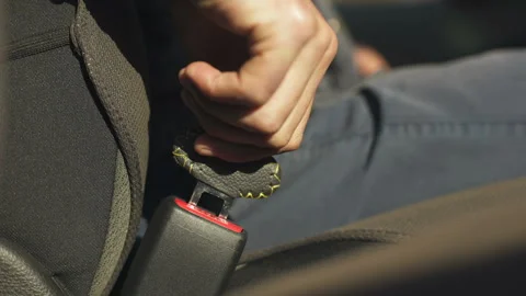 Driver is using anti seat belt Stock Footage 99907078