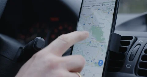 Driver Using Google Maps for Navigation Stock Footage 125224119