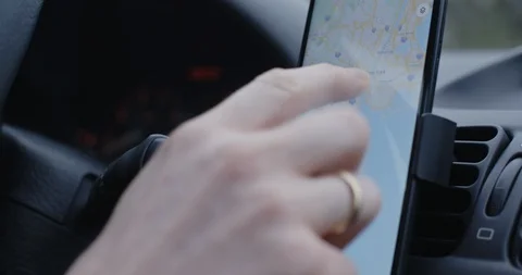 Driver Using Google Maps for Navigation Stock Footage 126562190