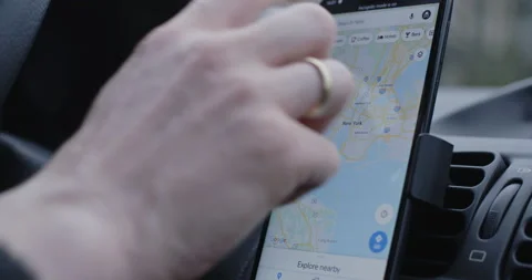 Driver Using Google Maps for Navigation Stock Footage 130400331