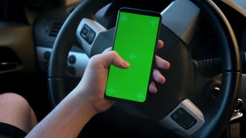 Driver using a smartphone inside the car. Stock Footage 247280280