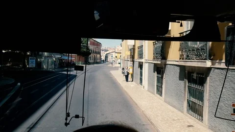 Driver view bus move forward by street and drive to bus stop Video stock 99136627