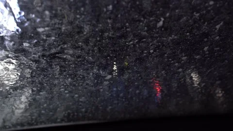 Driver view looking out through the windshield while going through an indoor Stock Footage 247274450