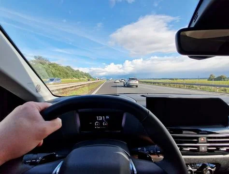 Driver view POV from car while driving a car Stockfoto's