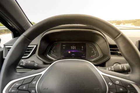 Driver view to the speedometer at 101 kmh. POV to Car Dashboard. Stock Photos