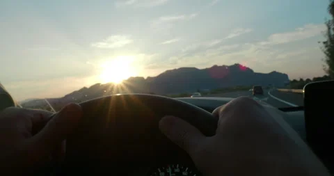 Driver view of sunset over highway Stock Footage 264588152